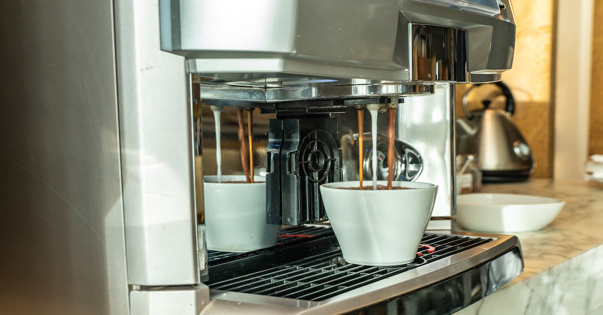 A high-end commercial bean-to-cup espresso machine with a touchscreen interface, provided to a Centennial corporate facility at zero cost by Viola Vending.