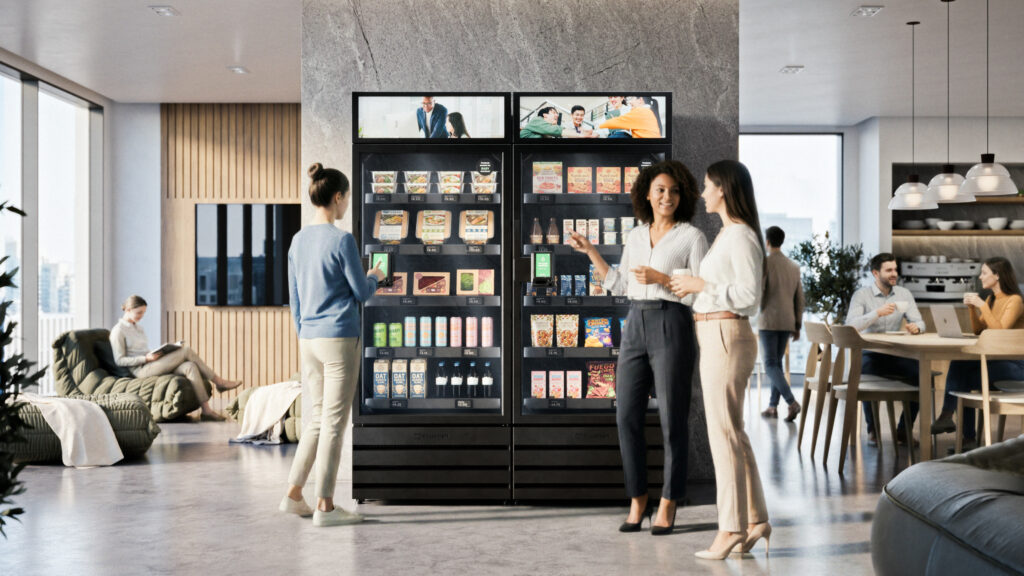 Fueling the Modern Workforce: Why Denver Facilities are Demanding Healthy Vending Options A sleek Viola Vending smart machine stocked with healthy snacks, local kombucha, and organic protein bars inside a modern Denver corporate office.